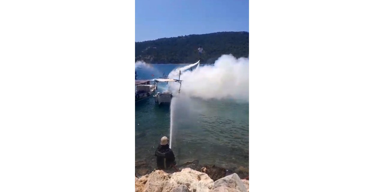 Yanan tekneye hortum, jet ski ve flyboard ile müdahale