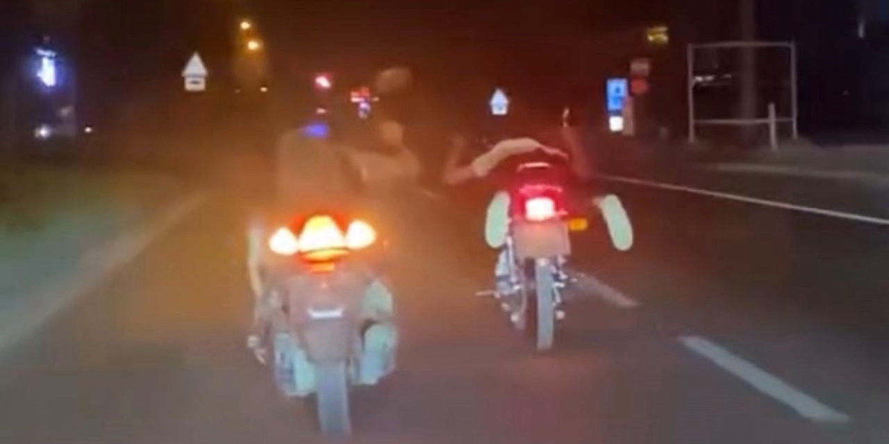 Bolu’da D-100’de motosikletin üstünde yatarak tehlikeli yolculuk yapan magandalar kamerada