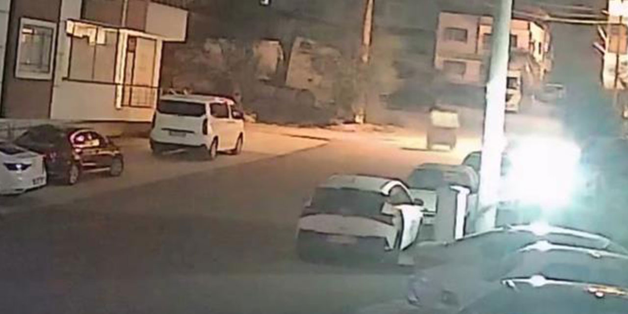 Şiddetli fırtınayla harekete geçen çöp konteyneri, iki otomobilin arasında durdu