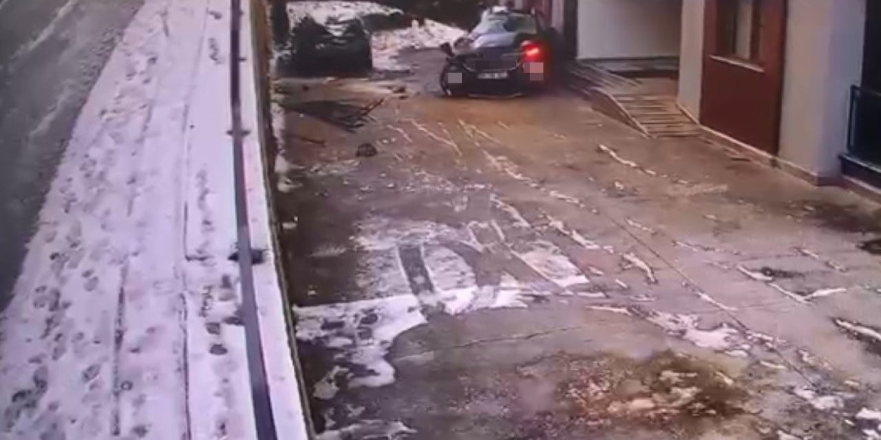 Buzlanan yolda kontrolden çıkan cip sitenin bahçesine uçtu