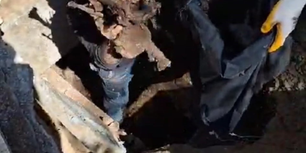 İkinci Defin İçin Kabirden Çıkardığı Kemikleri Fırlattığı Görüntüler Tepki Çekti