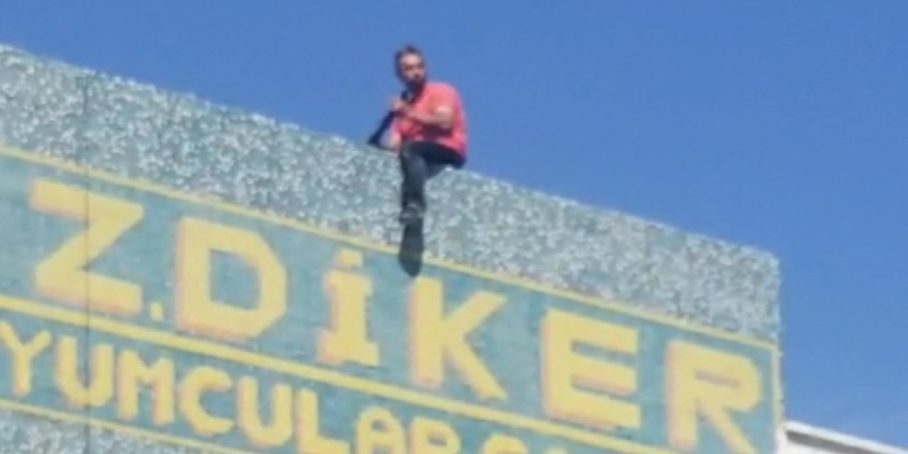 İş Yerinin Açılması İçin Çatıda Benzin Ve Tüfekle Eylem Yaptı, Polis İkna Edip İndirdi