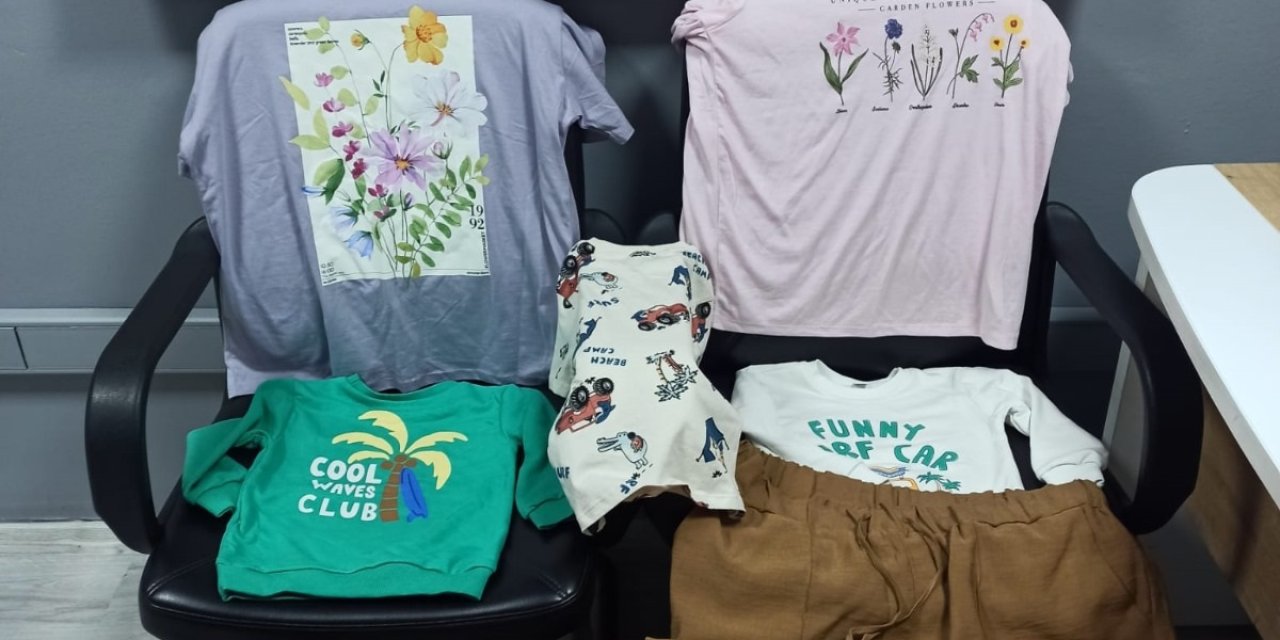 Mağazadaki Kıyafetleri İnceleyen Kadın, Alarmlarını Penseyle Söküp Çaldı