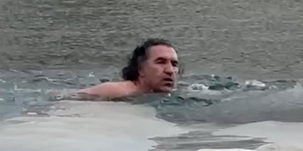 Rizeli doğa fotoğrafçısı 2 bin 850 rakımlı buzla kaplı gölde yüzdü